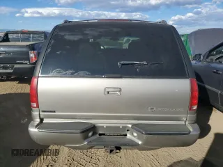2000 Cadillac Escalade z VIN 1GYEK63R3YR218500, wystawiony jako Copart lot #77676354 z przebiegiem 164 602 mil mil oraz Tytuł czysty. Historia ofert i sprzedaży dostępna na DreamBid. Obrazek 6.