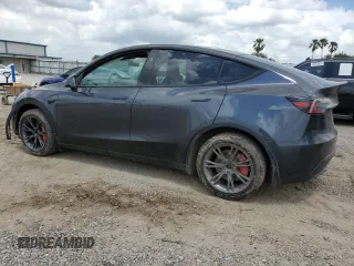 2024 Tesla Model Y Long Range with VIN 7SAYGDEE4RA316722, listed as a Copart auction lot 53207395 with 17,006 mi miles and Salvage title. Bid and sale history available at DreamBid. Image 2.