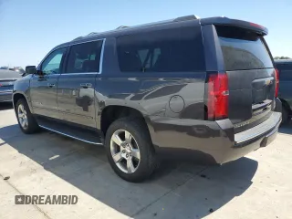 2018 Chevrolet Suburban Premier with VIN 1GNSCJKC4JR189639, listed as a Copart auction lot 64221035 with 110,256 mi miles and Salvage title. Bid and sale history available at DreamBid. Image 2.