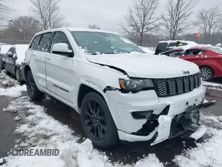 2017 Jeep Grand Cherokee Laredo with VIN 1C4RJFAG2HC951071, listed as a IAAI auction lot 41536568 with 99,941 mi miles. Bid and sale history available at carsss.com. Image 1.