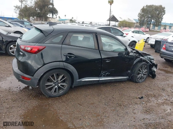 2016 Mazda CX-3 Grand Touring with VIN JM1DKBD7XG0125001, listed as a IAAI auction lot 41777712 with NaN miles. Bid and sale history available at carsss.com. Image 14.