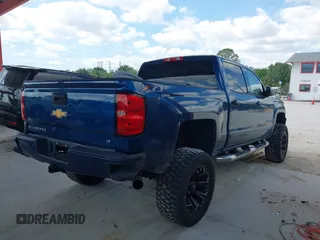 2018 Chevrolet Silverado 1500 LT with VIN 3GCUKREC0JG366590, listed as a IAAI auction lot 42045634 with 92,989 mi miles. Bid and sale history available at carsss.com. Image 4.