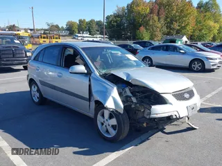 2009 Kia Rio LX with VIN KNADE243696547512, listed as a IAAI auction lot 40639932 with 204,809 mi miles. Bid and sale history available at carsss.com. Image 1.