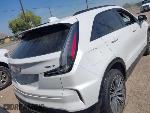 2024 Cadillac XT4 FWD Sport with VIN 1GYFZER43RF133293, listed as a IAAI auction lot 42055906 with 25,398 mi miles and . Bid and sale history available at DreamBid. Image 4.