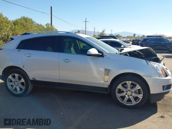 2013 Cadillac SRX Performance Collection with VIN 3GYFNDE37DS599557, listed as a IAAI auction lot 41633569 with 100,611 mi miles and . Bid and sale history available at DreamBid. Image 13.