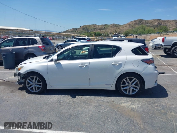 2014 Lexus CT 200h z VIN JTHKD5BH6E2191494, wystawiony jako IAAI lot #41987107 z przebiegiem 160 356 mil mil oraz . Historia ofert i sprzedaży dostępna na DreamBid. Obrazek 14.