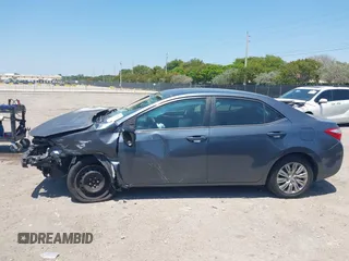 2015 Toyota Corolla L with VIN 2T1BURHEXFC449900, listed as a IAAI auction lot 42128227 with 127,479 mi miles and . Bid and sale history available at DreamBid. Image 15.