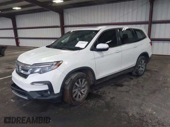 2021 Honda Pilot EX-L with VIN 5FNYF5H57MB022843, listed as a IAAI auction lot 41186957 with 57,836 mi miles. Bid and sale history available at carsss.com. Image 17.