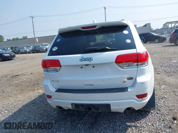 2015 Jeep Grand Cherokee Overland with VIN 1C4RJFCGXFC880096, listed as a IAAI auction lot 42706085 with 74,044 mi miles and . Bid and sale history available at DreamBid. Image 16.