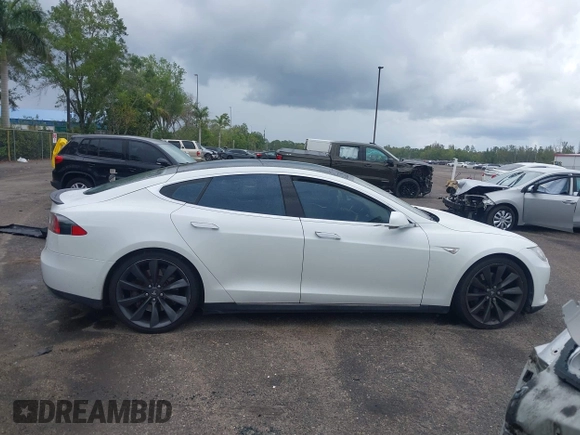 2013 Tesla Model S Performance with VIN 5YJSA1DP9DFP04076, listed as a IAAI auction lot 42185465 with 179,640 mi miles and . Bid and sale history available at DreamBid. Image 13.