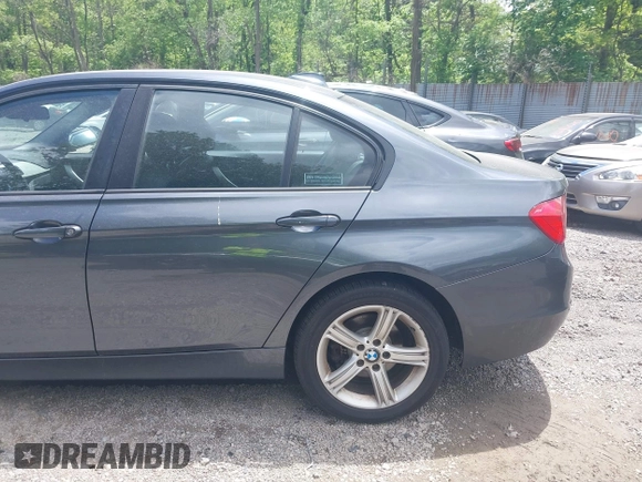 2014 BMW 3 Series 320i xDrive with VIN WBA3C3C57EP662795, listed as a IAAI auction lot 42267683 with 153,451 mi miles and . Bid and sale history available at DreamBid. Image 19.