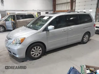 2010 Honda Odyssey EX-L z VIN 5FNRL3H75AB009698, wystawiony jako IAAI lot #42855966 z przebiegiem 215 138 mil mil oraz . Historia ofert i sprzedaży dostępna na DreamBid. Obrazek 2.