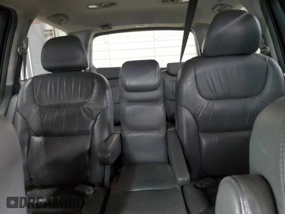 2005 Honda Odyssey EX-L with VIN 5FNRL38785B054186, listed as a Copart auction lot 58072125 with 219,928 mi miles and Salvage title. Bid and sale history available at DreamBid. Image 10.