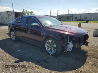 2011 Ford Taurus Limited with VIN 1FAHP2FW6BG142472, listed as a Copart auction lot 58534985 with 154,984 mi miles and Salvage title. Bid and sale history available at DreamBid. Image 4.