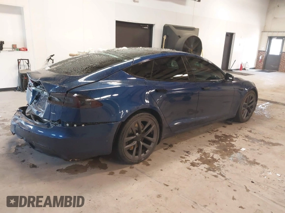 2021 Tesla Model S Plaid with VIN 5YJSA1E6XMF439884, listed as a IAAI auction lot 41622750 with Not provided miles and . Bid and sale history available at DreamBid. Image 4.