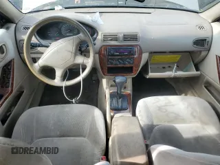 2001 Mitsubishi Galant ES z VIN 4A3AA46G71E214935, wystawiony jako Copart lot #77423604 z przebiegiem Nie podano mil oraz Czysty tytuł • Clean title. Historia ofert i sprzedaży dostępna na DreamBid. Obrazek 8.