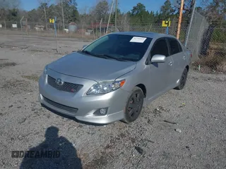 2009 Toyota Corolla with VIN 1NXBU40E29Z064526, listed as a IAAI auction lot 41790965 with 122,578 mi miles. Bid and sale history available at carsss.com. Image 2.