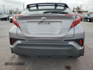 2018 Toyota C-HR XLE z VIN NMTKHMBX3JR023403, wystawiony jako Copart lot #54574245 z przebiegiem 119 657 mil mil oraz Szkoda całkowita • Salvage title. Historia ofert i sprzedaży dostępna na DreamBid. Obrazek 6.