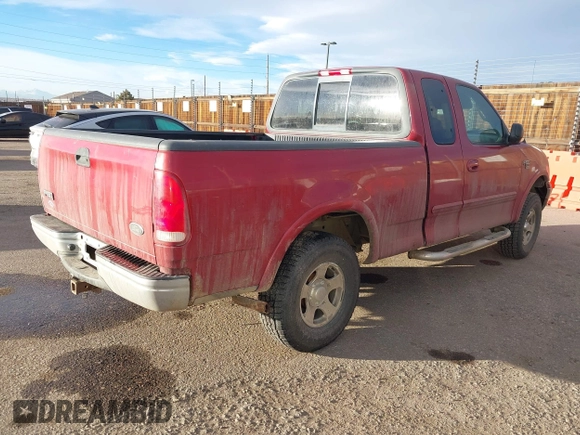 2001 Ford F-150 XL with VIN 1FTRX18L21NB46718, listed as a IAAI auction lot 41477101 with 156,702 mi miles. Bid and sale history available at carsss.com. Image 4.