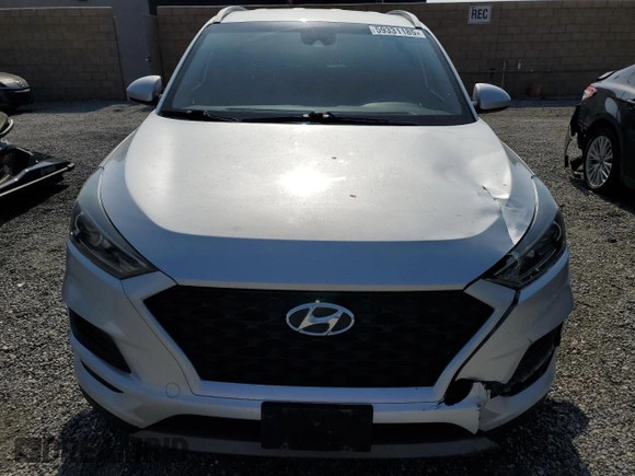 2019 Hyundai Tucson SEL with VIN KM8J33AL7KU841214, listed as a Copart auction lot 59331185 with 99,150 mi miles and Salvage title. Bid and sale history available at DreamBid. Image 5.