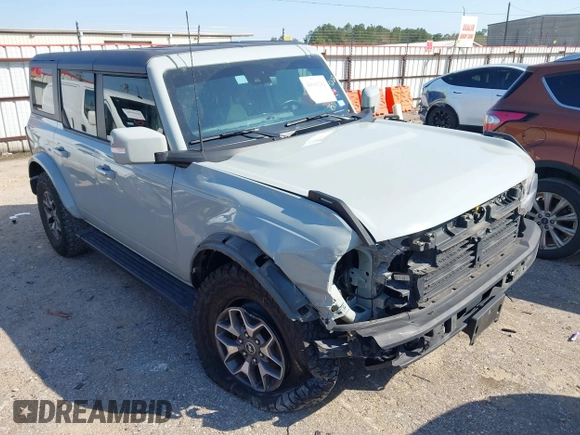 2023 Ford Bronco z VIN 1FMDE5BH5PLB37801, wystawiony jako IAAI lot #41691282 z przebiegiem 21 129 mil mil oraz . Historia ofert i sprzedaży dostępna na DreamBid. Obrazek 1.
