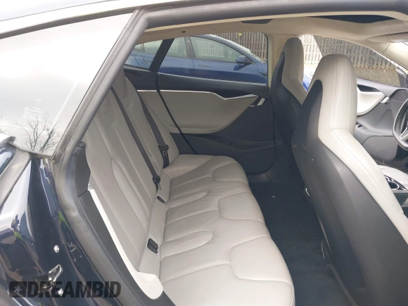 2014 Tesla Model S 60 with VIN 5YJSA1S12EFP42605, listed as a IAAI auction lot 40905031 with 68,155 mi miles and . Bid and sale history available at DreamBid. Image 8.