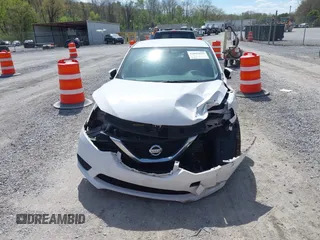 2017 Nissan Sentra SV with VIN 3N1AB7APXHY338187, listed as a IAAI auction lot 42091823 with 87,814 mi miles and . Bid and sale history available at DreamBid. Image 12.