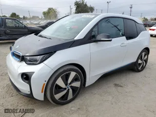 2017 BMW i3 with VIN WBY1Z6C32H7A39499, listed as a Copart auction lot 82635404 with 67,258 mi miles and Salvage Title. Bid and sale history available at carsss.com. Image 1.