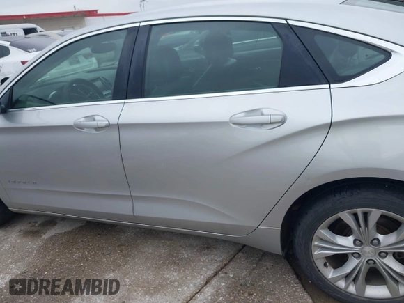 2014 Chevrolet Impala LT with VIN 2G1125S33E9103583, listed as a IAAI auction lot 42125293 with 143,951 mi miles and . Bid and sale history available at DreamBid. Image 14.