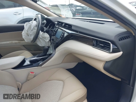 2019 Toyota Camry LE with VIN 4T1B11HK2KU743445, listed as a IAAI auction lot 42129688 with 284,938 mi miles and . Bid and sale history available at DreamBid. Image 5.