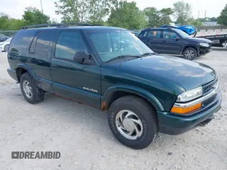 2002 Chevrolet Blazer LS with VIN 1GNDT13W12K157145, listed as a IAAI auction lot 42446260 with 182,713 mi miles and . Bid and sale history available at DreamBid. Image 1.