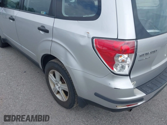 2010 Subaru Forester X with VIN JF2SH6BC0AH788214, listed as a IAAI auction lot 42572954 with 185,564 mi miles and . Bid and sale history available at DreamBid. Image 6.