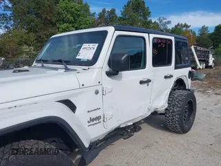 2018 Jeep Wrangler Unlimited Sahara z VIN 1C4HJXEG4JW220092, wystawiony jako IAAI lot #40522478 z przebiegiem 90 529 mil mil oraz . Historia ofert i sprzedaży dostępna na DreamBid. Obrazek 6.
