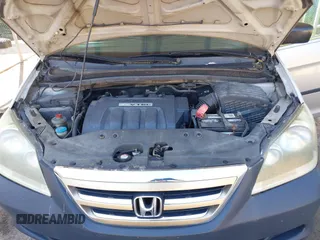 2005 Honda Odyssey LX z VIN 5FNRL38275B117069, wystawiony jako IAAI lot #42232470 z przebiegiem 265 180 mil mil oraz . Historia ofert i sprzedaży dostępna na DreamBid. Obrazek 10.