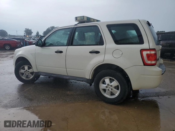 2011 Ford Escape XLS with VIN 1FMCU0C74BKC27897, listed as a Copart auction lot 63084415 with 116,423 mi miles and Clean title. Bid and sale history available at DreamBid. Image 2.