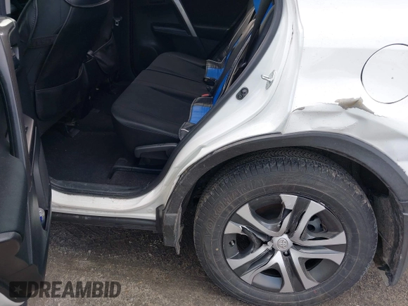 2018 Toyota RAV4 LE with VIN JTMBFREV5JJ738405, listed as a IAAI auction lot 41956145 with 100,593 mi miles and . Bid and sale history available at DreamBid. Image 18.