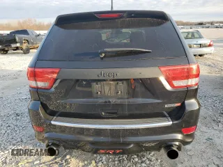 2012 Jeep Grand Cherokee SRT8 with VIN 1C4RJFDJ2CC265421, listed as a Copart auction lot 48654325 with 115,514 mi miles and Salvage Title. Bid and sale history available at carsss.com. Image 6.