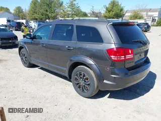 2017 Dodge Journey SE with VIN 3C4PDCAB0HT701026, listed as a IAAI auction lot 41797969 with 80,477 mi miles and . Bid and sale history available at DreamBid. Image 3.