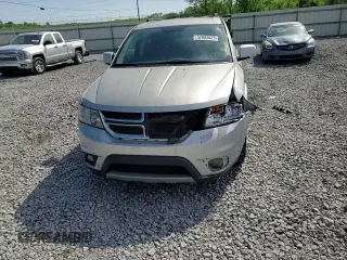 2014 Dodge Journey SXT z VIN 3C4PDCBG7ET126901, wystawiony jako Copart lot #52882625 z przebiegiem 176 923 mil mil oraz Szkoda całkowita • Salvage title. Historia ofert i sprzedaży dostępna na DreamBid. Obrazek 11.
