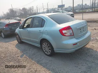 2009 Suzuki SX4 Sport FWD with VIN JS2YC414996201530, listed as a IAAI auction lot 41476333 with 148,263 mi miles and . Bid and sale history available at DreamBid. Image 3.
