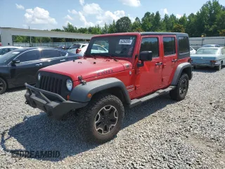 2012 Jeep Wrangler Unlimited Sport with VIN 1C4BJWDG8CL130689, listed as a Copart auction lot 62262095 with 126,906 mi miles and Salvage title. Bid and sale history available at DreamBid. Image 1.