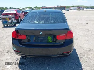 2015 BMW 3 Series 328i with VIN WBA3C1C58FK123489, listed as a IAAI auction lot 42026400 with 127,880 mi miles and . Bid and sale history available at carsss.com. Image 16.