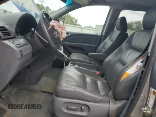 2007 Honda Odyssey EX-L z VIN 5FNRL38657B011922, wystawiony jako Copart lot #56147975 z przebiegiem 149 451 mil mil oraz Szkoda całkowita • Salvage title. Historia ofert i sprzedaży dostępna na DreamBid. Obrazek 7.