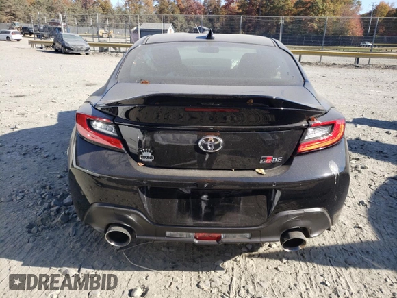 2024 Toyota GR86 Premium with VIN JF1ZNBE16R8756975, listed as a Copart auction lot 77411004 with 5,458 mi miles and Salvage Title. Bid and sale history available at carsss.com. Image 6.