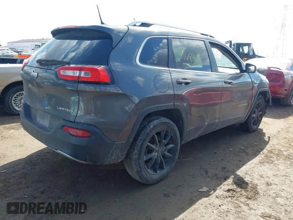 2015 Jeep Cherokee Limited with VIN 1C4PJMDB7FW591772, listed as a IAAI auction lot 41684106 with 118,708 mi miles and . Bid and sale history available at DreamBid. Image 4.
