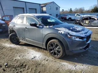 2023 Mazda CX-30 S Carbon Edition with VIN 3MVDMBCM9PM545538, listed as a Copart auction lot 86072184 with 29,395 mi miles and Salvage Title. Bid and sale history available at DreamBid. Image 4.
