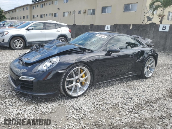 2015 Porsche 911 Turbo S z VIN WP0AD2A94FS166536, wystawiony jako Copart lot #71944844 z przebiegiem 9 222 mil mil oraz Szkoda całkowita • Salvage title. Historia ofert i sprzedaży dostępna na DreamBid. Obrazek 1.
