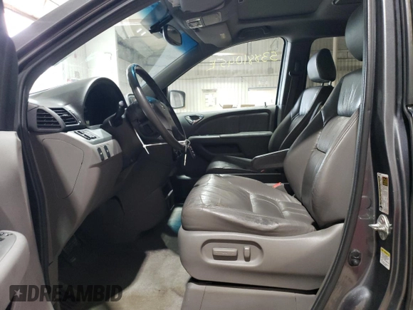 2010 Honda Odyssey EX-L with VIN 5FNRL3H76AB113634, listed as a Copart auction lot 53881045 with 214,478 mi miles and Salvage Title. Bid and sale history available at carsss.com. Image 7.