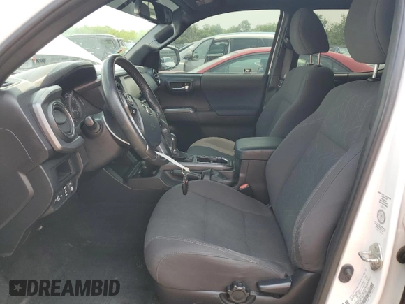 2017 Toyota Tacoma SR5 with VIN 3TMCZ5AN7HM105170, listed as a Copart auction lot 57628685 with 52,654 mi miles and Salvage title. Bid and sale history available at DreamBid. Image 7.