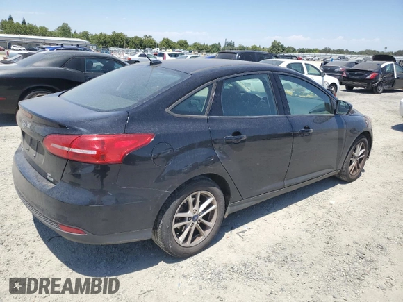 2018 Ford Focus SE with VIN 1FADP3FE8JL205699, listed as a Copart auction lot 63300795 with 128,877 mi miles and Clean title. Bid and sale history available at DreamBid. Image 3.